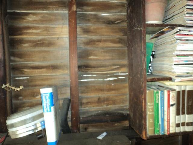 View of siding from inside of the garage of a Thousand Oaks home inspection.