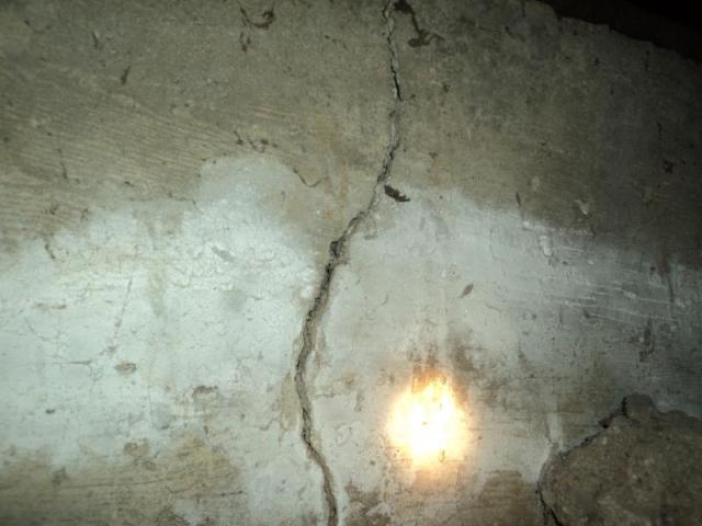 Foundation wall cracks found during an Encino home inspection.